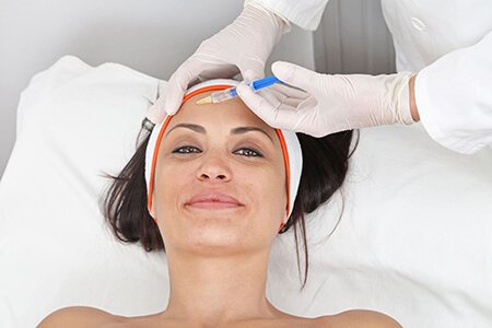 JUVÉDERM lip and cheek filler treatment at Malouf Dermatology in Dallas-Fort Worth.